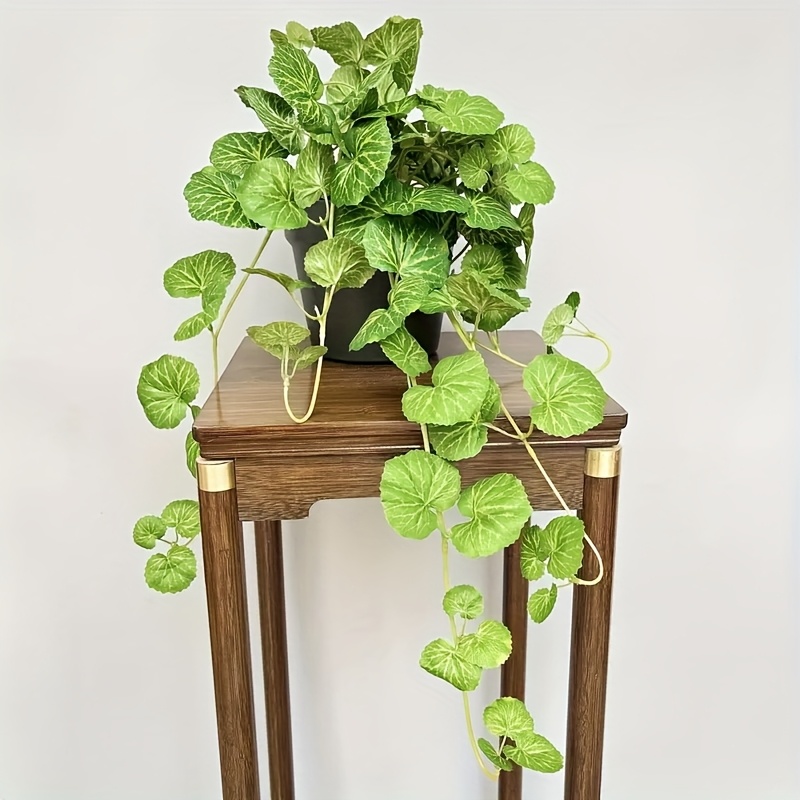 An artificial hanging vine pla - огляд і ціна Pilea Peperomioides